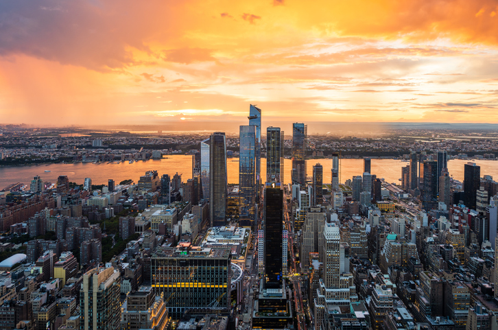 A beautiful colourful sunset during rainy storm over the Hudson Yards in New York City.